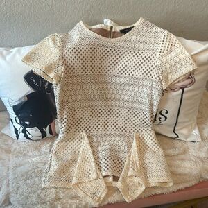 Timeless short sleeve blouse in cream and beige perfect for the fall.